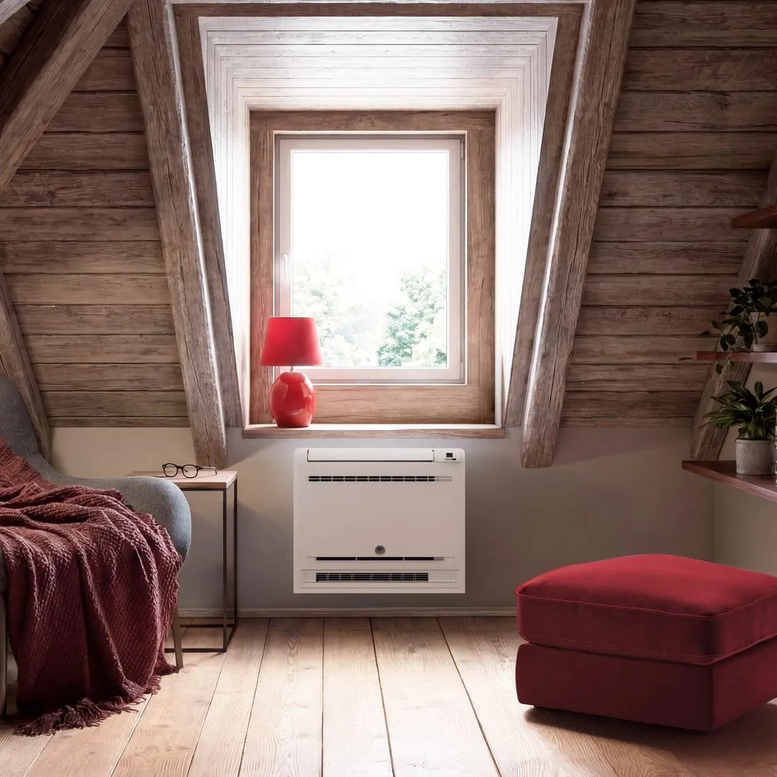 Climatiseur console installé en allège sous une fenêtre